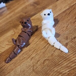 Articulated Otter Figurines - Brown & White